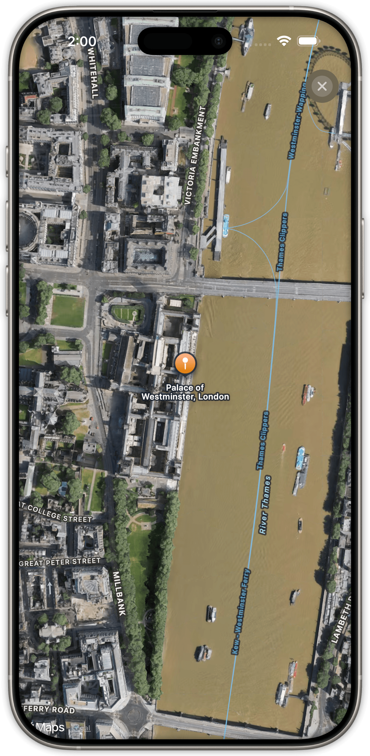 A 3D satellite map pinned on the Palace of Westminster beside the River Thames