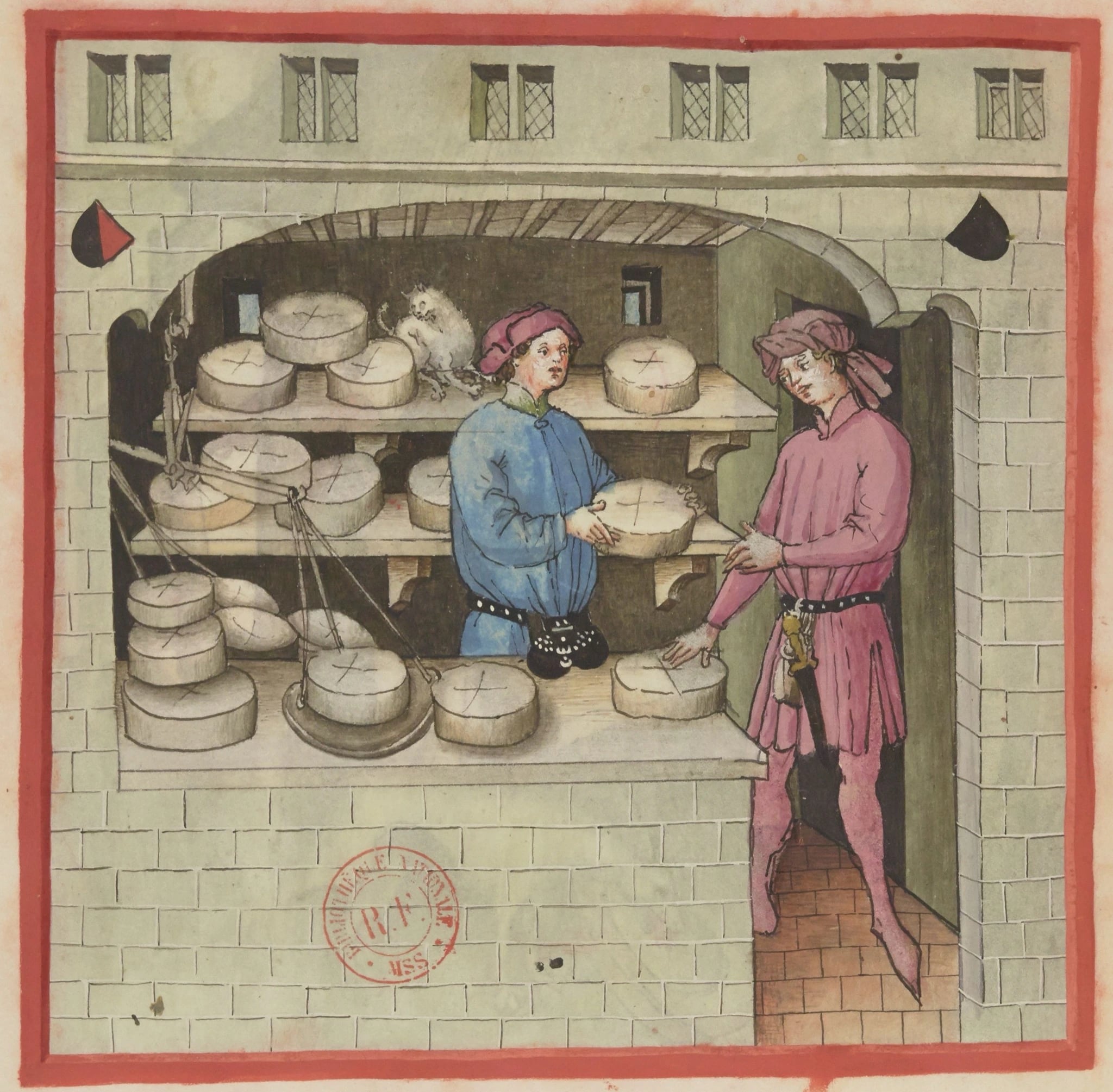 A fifteenth-century manuscript illumination of a cheese shop. Behind a stone counter a seller in a blue tunic lifts a round cheese towards a customer in a pink tunic and hood who is standing in the doorway. Three shelves behind the seller are stacked with pale round cheeses, each scored with a cross, and a white cat sits among them. A pair of balance scales hangs at the left.