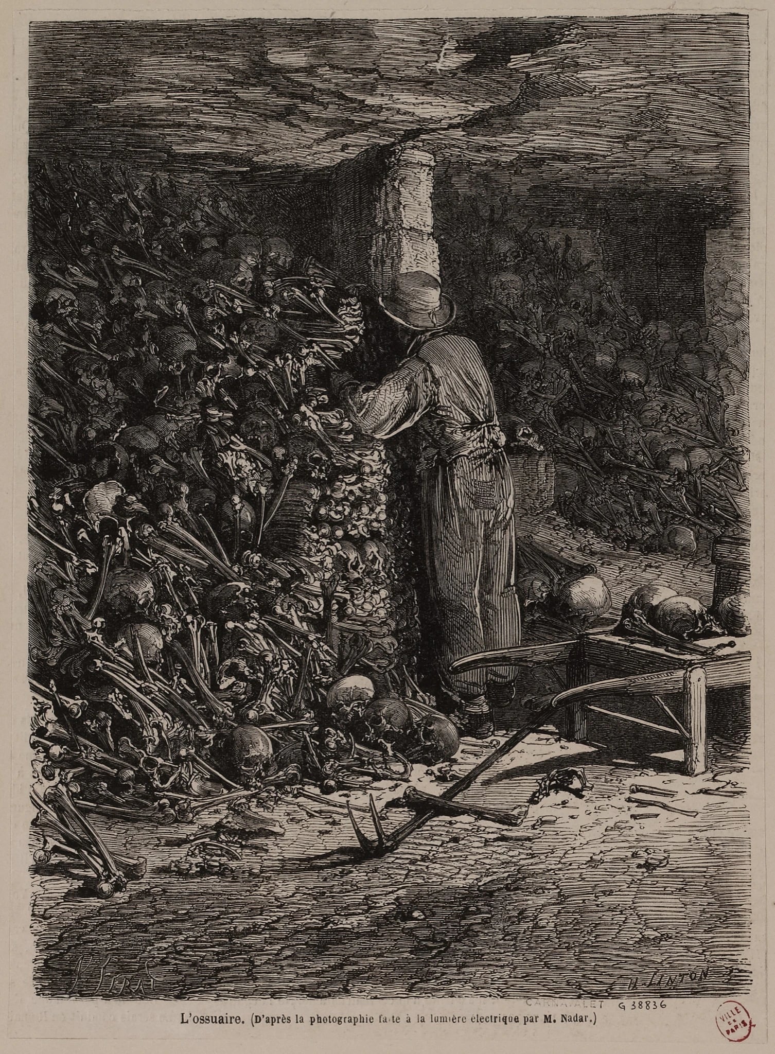 A dark wood engraving: a man in a smock and hat stands in a low stone tunnel building a wall out of stacked skulls and leg bones, loose heaps of bones sloping away on either side of him, a pick lying on the floor and a wheelbarrow beside him carrying two skulls.
