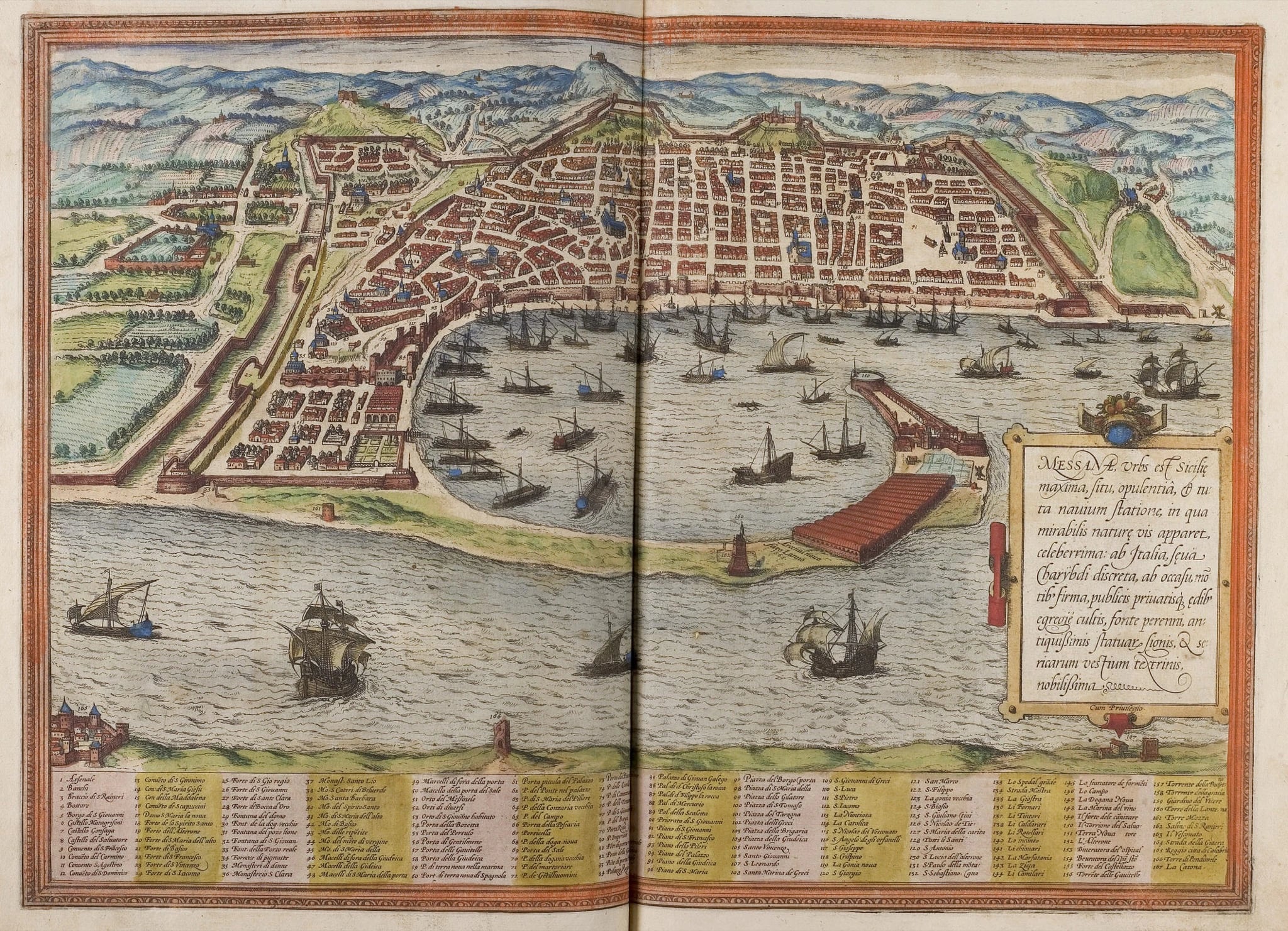 A hand-coloured bird's-eye engraving of a walled city on a curving shore, its streets laid out in a dense grid of red-roofed houses against green hills. A long thin spit of land curls out from the right to enclose a harbour crowded with small oared and sailing vessels. A Latin cartouche sits at the lower right and a numbered key runs across the bottom of the plate.